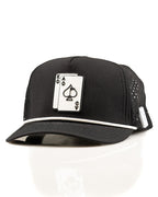 Ace/King Black perforated rope golf hat by Pins & Aces featuring a black poker-inspired design, braided rope accent, adjustable snapback, and built-in magnetic ball marker holder.