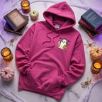 Little Ghost Iced Coffee Halloween hoodie featuring a cute ghost holding an iced coffee on a cozy classic-fit graphic sweatshirt in Heliconia