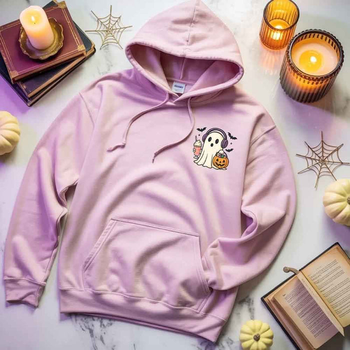 Little Ghost Iced Coffee Halloween hoodie featuring a cute ghost holding an iced coffee on a cozy classic-fit graphic sweatshirt in Light Pink