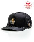 Pins & Aces Sasquatch Black perforated golf rope hat with adjustable snapback, magnetic ball marker holder, and matching golf ball marker.