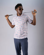 Pins & Aces American Traditional men’s golf polo featuring a bold patriotic Americana and classic tattoo flash-inspired design with an athletic performance fit.