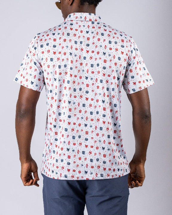 Pins & Aces American Traditional men’s golf polo featuring a bold patriotic Americana and classic tattoo flash-inspired design with an athletic performance fit.