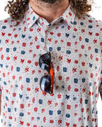 Pins & Aces American Traditional men’s golf polo featuring a bold patriotic Americana and classic tattoo flash-inspired design with an athletic performance fit.
