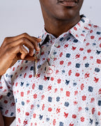 Pins & Aces American Traditional men’s golf polo featuring a bold patriotic Americana and classic tattoo flash-inspired design with an athletic performance fit.