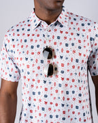 Pins & Aces American Traditional men’s golf polo featuring a bold patriotic Americana and classic tattoo flash-inspired design with an athletic performance fit.