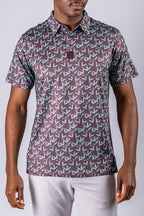 Men’s Cocoa Verde golf polo by Pins & Aces featuring a cocoa brown background with an all-over teal geometric print, short sleeves, and athletic performance fit.