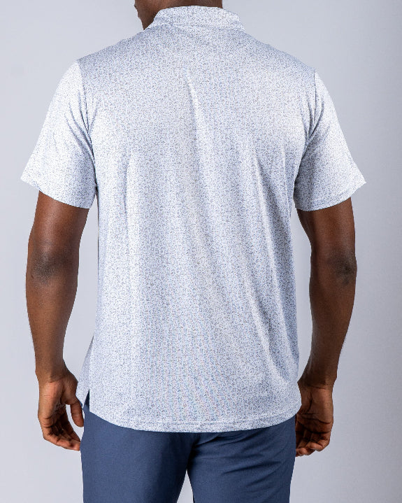 Men’s Man’s Best Friend Light golf polo by Pins & Aces featuring a subtle dog-inspired micro print in light blue and white with short sleeves and an athletic performance fit.