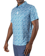 Men’s Maze Craze golf polo by Pins & Aces featuring an all-over blue maze-inspired geometric pattern with short sleeves and an athletic performance fit.