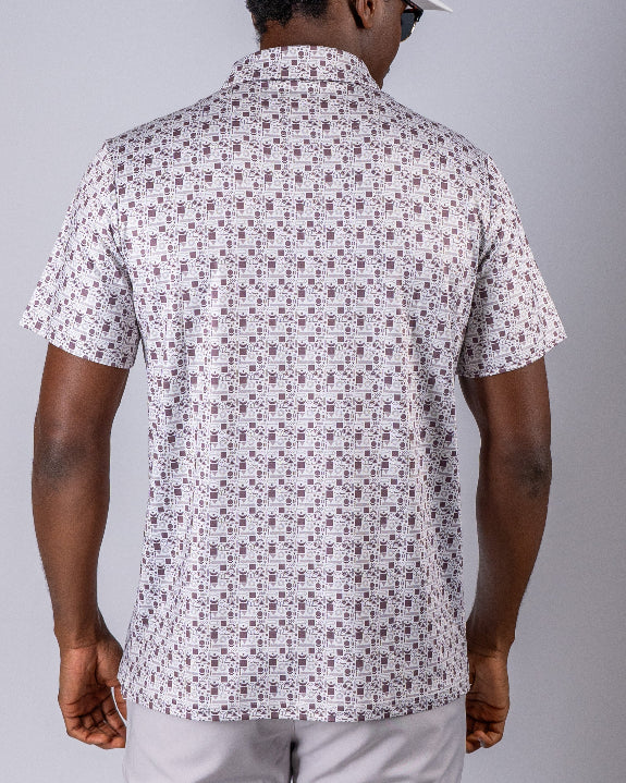 Men’s Retro Form golf polo by Pins & Aces featuring a vintage-inspired geometric print in neutral tones with burgundy accents, short sleeves, and an athletic fit.