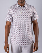 Men’s Retro Form golf polo by Pins & Aces featuring a vintage-inspired geometric print in neutral tones with burgundy accents, short sleeves, and an athletic fit.
