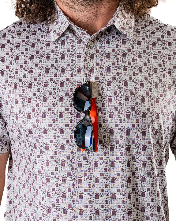 Men’s Retro Form golf polo by Pins & Aces featuring a vintage-inspired geometric print in neutral tones with burgundy accents, short sleeves, and an athletic fit.