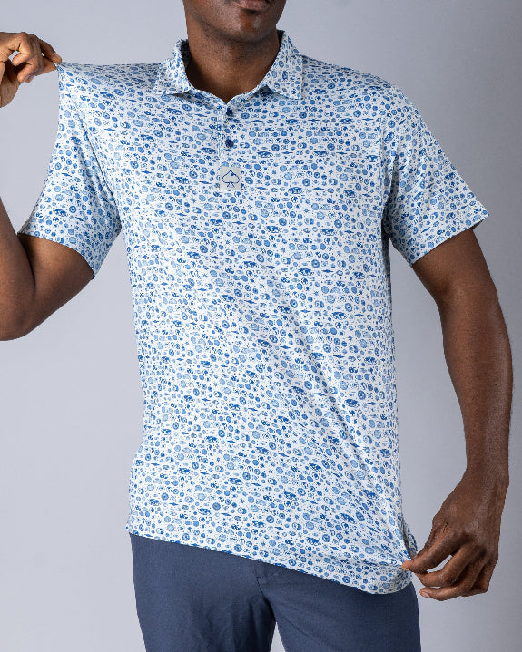 Pins & Aces Signal Boost men’s performance golf polo featuring an athletic fit with breathable fast-wicking fabric, SPF 45+ protection, and built-in sunglasses holder.