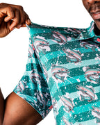 Men’s Trout Splatter golf polo by Pins & Aces featuring an all-over trout fishing print with teal, aqua, coral, and white splatter details and an athletic performance fit.