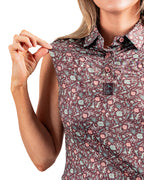 Women’s Desert Sage performance golf polo by Pins & Aces featuring a lightweight breathable design, short sleeves, athletic fit, and moisture-wicking golf fabric.