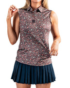 Women’s Desert Sage performance golf polo by Pins & Aces featuring a lightweight breathable design, short sleeves, athletic fit, and moisture-wicking golf fabric.