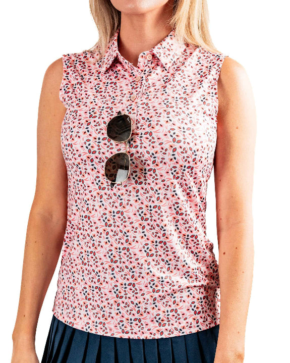 Women’s Soft Spoken golf polo by Pins & Aces featuring a sleeveless collared design with an all-over coral, pink, gray, and black micro floral print and athletic performance fit.