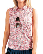 Women’s Soft Spoken golf polo by Pins & Aces featuring a sleeveless collared design with an all-over coral, pink, gray, and black micro floral print and athletic performance fit.