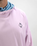 Men’s Flower Doodle Blue performance golf hoodie by Pins & Aces featuring a light pink body, blue floral doodle printed hood interior, embroidered spade logo, and long sleeves.