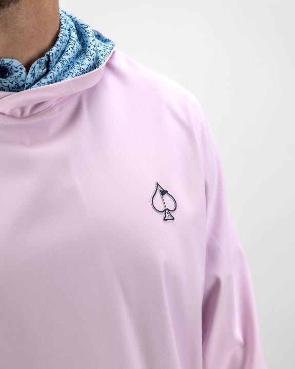 Men’s Flower Doodle Blue performance golf hoodie by Pins & Aces featuring a light pink body, blue floral doodle printed hood interior, embroidered spade logo, and long sleeves.
