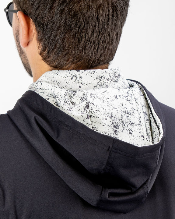 Men’s White Noise Performance Golf Hoodie by Pins & Aces featuring a black lightweight stretch body, embroidered spade chest logo, long sleeves, and White Noise printed hood lining.