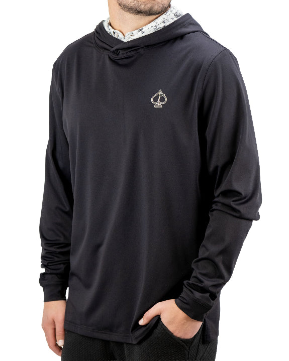 Men’s White Noise Performance Golf Hoodie by Pins & Aces featuring a black lightweight stretch body, embroidered spade chest logo, long sleeves, and White Noise printed hood lining.