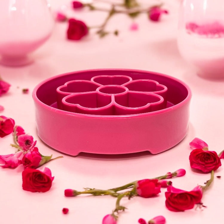 SodaPup Flower eBowl deep slow feeder dog bowl with flower-shaped enrichment ridges, available in pink or purple for medium and large dogs.