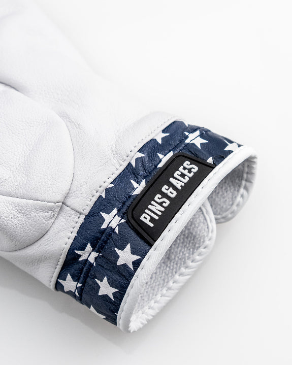 Pins & Aces Premium Tour Stars men’s golf glove made from 100% premium AAA Cabretta leather with a stars-inspired design and moisture-wicking wrist lining.