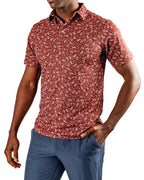 Men’s Autumn Bloom golf polo by Pins & Aces featuring a rust-colored all-over cream floral print, short sleeves, blade collar, and athletic performance fit.