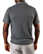 Men’s Jade Drops golf polo by Pins & Aces featuring a dark jade green geometric pattern, modern blade collar, short sleeves, and athletic performance fit.