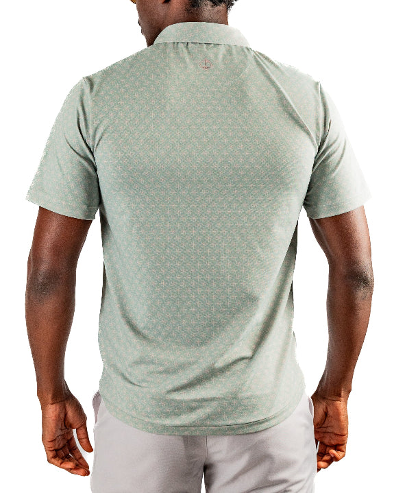 Men’s Origami Player Preferred golf polo by Pins & Aces featuring a sage green tonal geometric pattern, blade collar, short sleeves, and athletic performance fit.