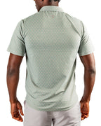 Men’s Origami Player Preferred golf polo by Pins & Aces featuring a sage green tonal geometric pattern, blade collar, short sleeves, and athletic performance fit.