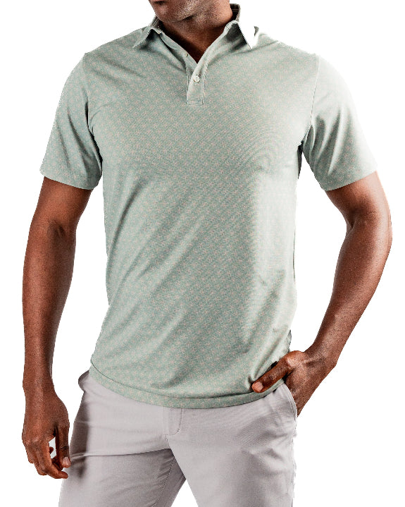 Men’s Origami Player Preferred golf polo by Pins & Aces featuring a sage green tonal geometric pattern, blade collar, short sleeves, and athletic performance fit.