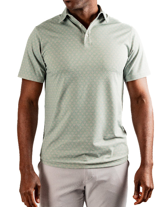 Men’s Origami Player Preferred golf polo by Pins & Aces featuring a sage green tonal geometric pattern, blade collar, short sleeves, and athletic performance fit.