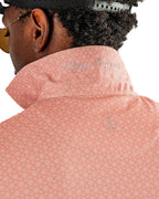 Men’s Phoenix Whirl golf polo by Pins & Aces featuring a bold swirling colorful print, modern blade collar, short sleeves, and athletic performance fit.