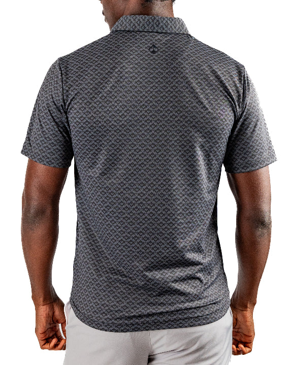 Men’s Slate Mosaic Player Preferred golf polo by Pins & Aces featuring a slate gray geometric pattern, modern blade collar, short sleeves, and athletic performance fit.
