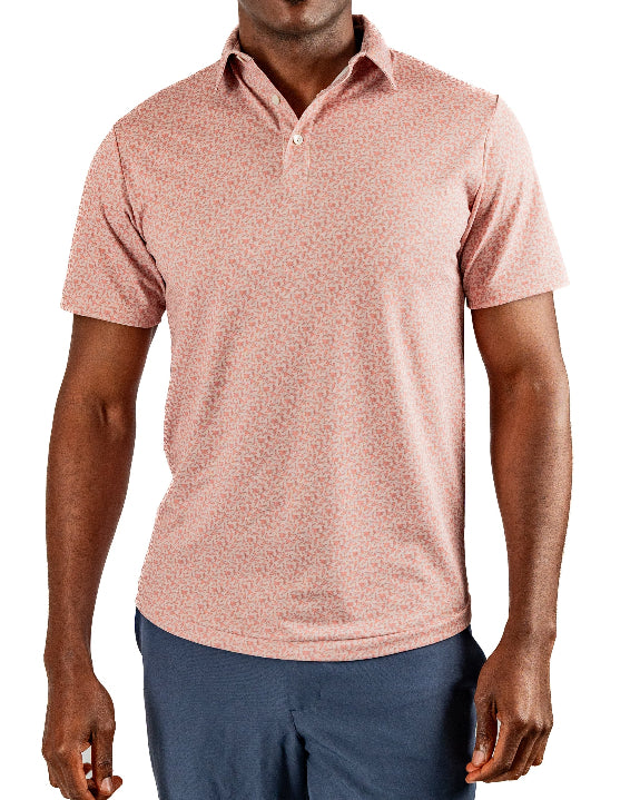 Men’s Sparrows Player Preferred golf polo by Pins & Aces featuring a coral and cream micro-pattern, blade collar, short sleeves, and athletic performance fit.