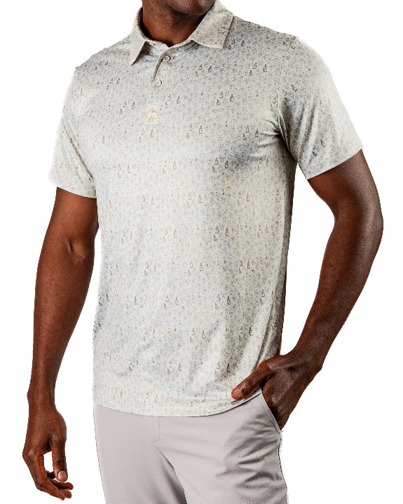 Men’s Drinking Buddies golf polo by Pins & Aces featuring a subtle drinking-inspired all-over print on a cream short-sleeve performance polo with an athletic fit.