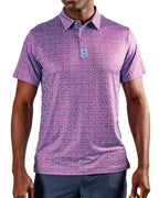 Men’s Sugar Circuit golf polo by Pins & Aces featuring a vibrant pink, purple, and blue geometric all-over pattern with short sleeves and an athletic performance fit.