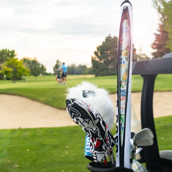 Pins & Aces insulated golf seltzer sleeve designed to hold up to six standard cans and slide into the club slot of most golf bags.