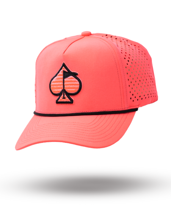 Highlighter pink perforated rope golf hat by Pins & Aces featuring an embroidered Fairway Wave Spade logo, adjustable snapback, and built-in magnetic golf ball marker holder.