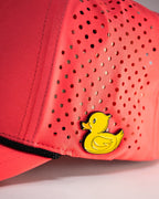 Highlighter pink perforated rope golf hat by Pins & Aces featuring an embroidered Fairway Wave Spade logo, adjustable snapback, and built-in magnetic golf ball marker holder.