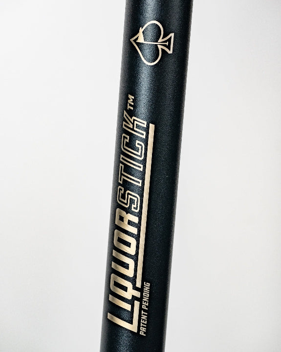 Black LiquorStick® 3.0 golf drink dispenser featuring a 750ml stainless steel reservoir, USB-C rechargeable automatic pump, insulated construction, and ground spike.