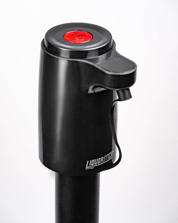 Black LiquorStick® 3.0 golf drink dispenser featuring a 750ml stainless steel reservoir, USB-C rechargeable automatic pump, insulated construction, and ground spike.