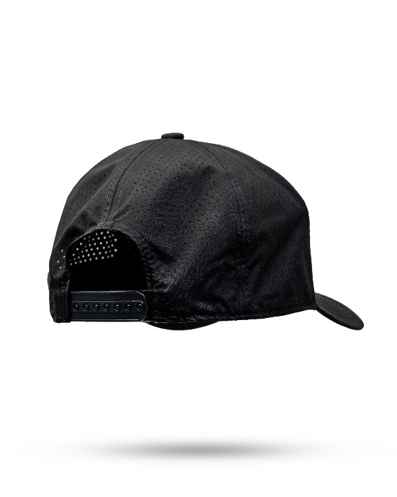 Tradesman Black golf hat by Pins & Aces featuring structured 6-panel construction, adjustable snapback closure, and a built-in magnetic golf ball marker holder.