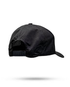 Tradesman Black golf hat by Pins & Aces featuring structured 6-panel construction, adjustable snapback closure, and a built-in magnetic golf ball marker holder.