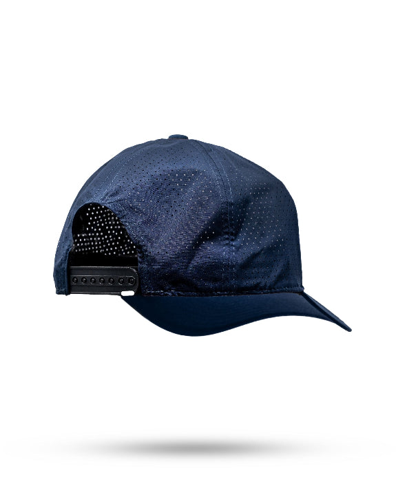 Tradesman Navy golf hat by Pins & Aces featuring a tonal embroidered spade logo, structured 6-panel design, perforated side panels, curved bill, and adjustable snapback.