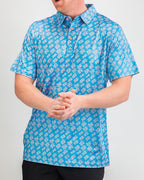 Men’s Skyline Dash Blue golf polo by Pins & Aces featuring a bright blue geometric dash pattern with pink accents and an athletic performance fit.