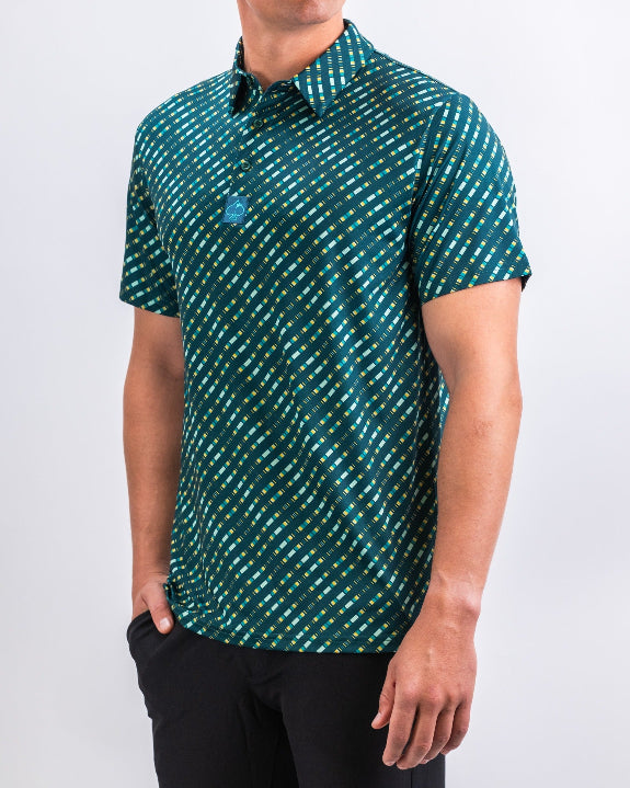 Men’s Chromo Green performance golf polo by Pins & Aces featuring an all-over green, blue, and yellow diagonal geometric stripe pattern with short sleeves and an athletic fit.