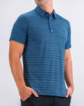 Men’s Rising Tides golf polo by Pins & Aces featuring a repeating blue and navy wave-inspired pattern, short sleeves, and an athletic performance fit.
