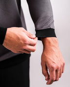 Men’s Player Preferred™ Slate Grey performance golf crewneck by Pins & Aces featuring a classic crew neckline, long sleeves, elastic cuffs and waist, and a tailored course-to-clubhouse fit.